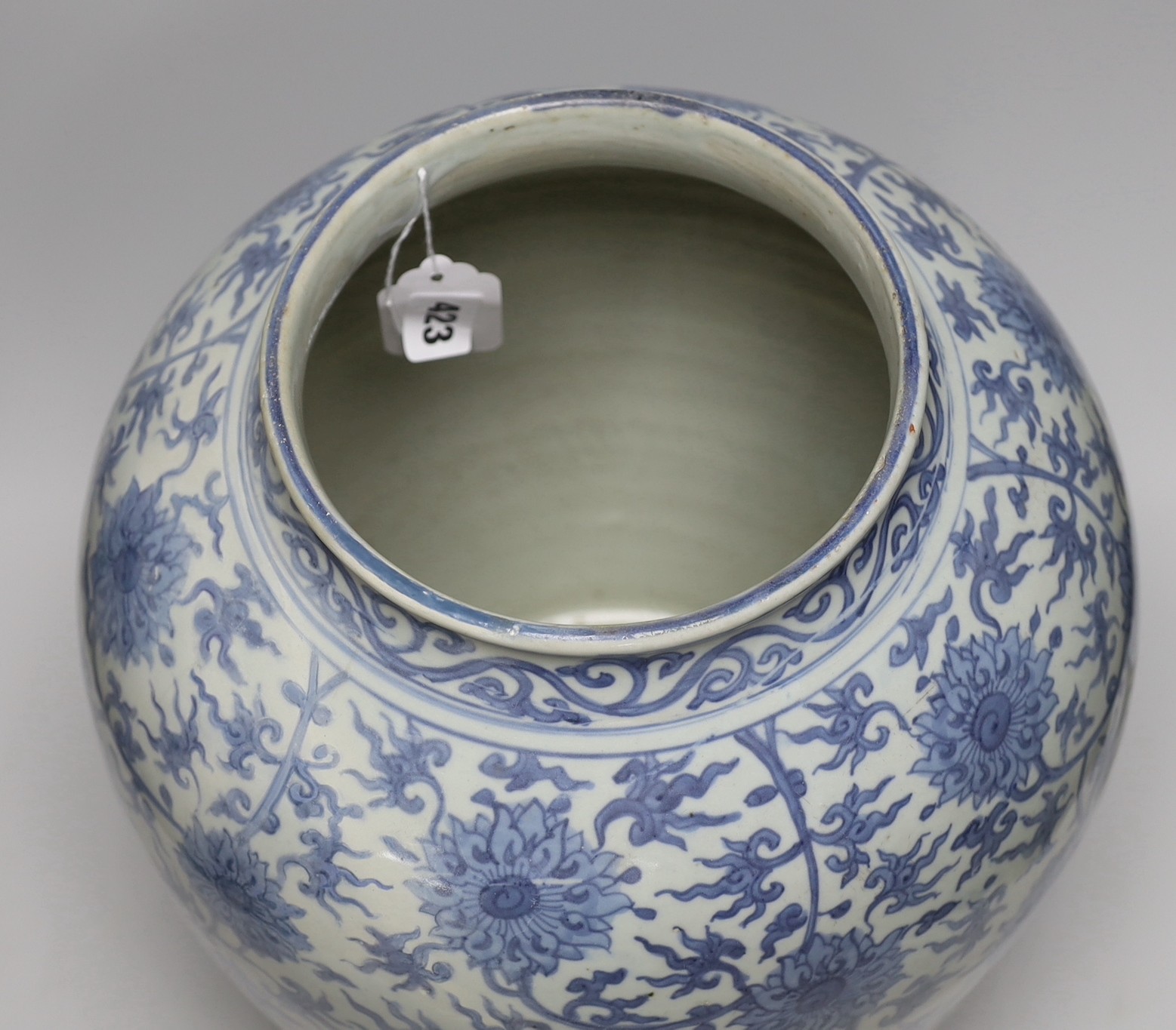 A Chinese blue and white 'lotus' jar, 17th century, 38cms high, restored
